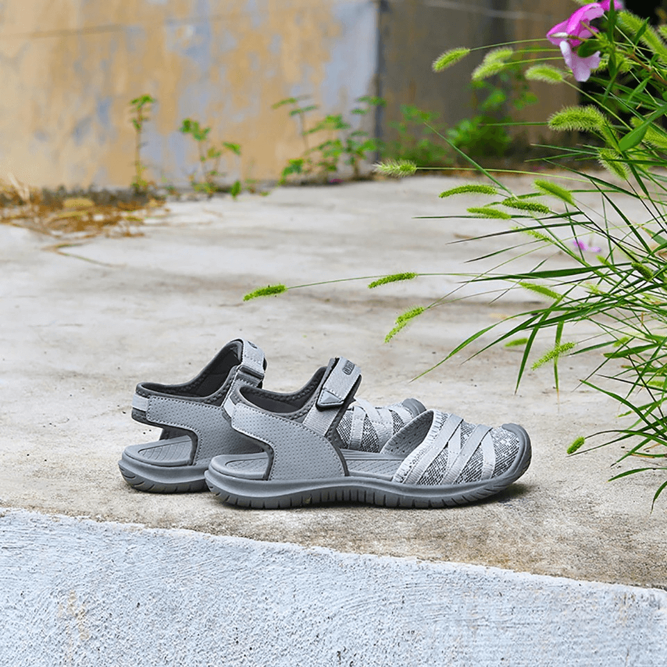 Casual Closed Toe Flat Heels Women's Sandals on a walkway, perfect for comfortable trekking and travel, featuring a sleek design.